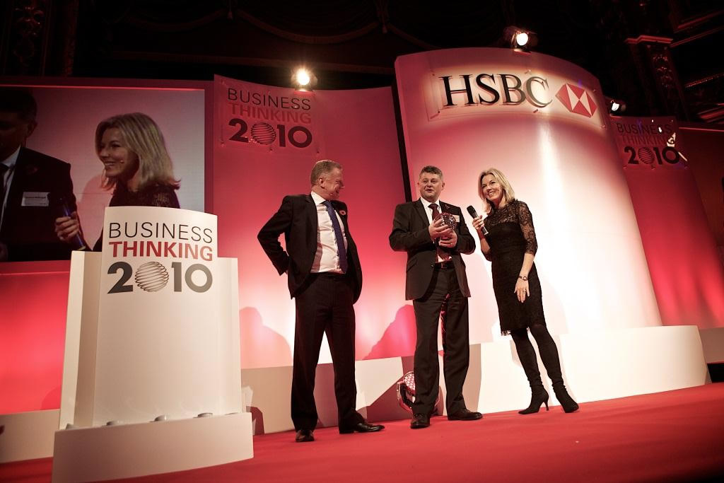 Laurence McDougall is presented with All Steels Trading’s HSBC Business Thinking 2010 winner’s trophy from ITN newsreader Mary Nightingale.